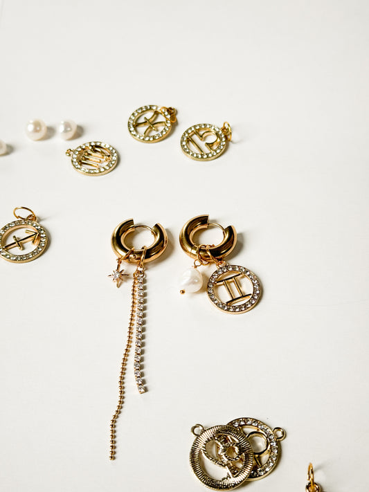 Zodiac earrings with a pearl