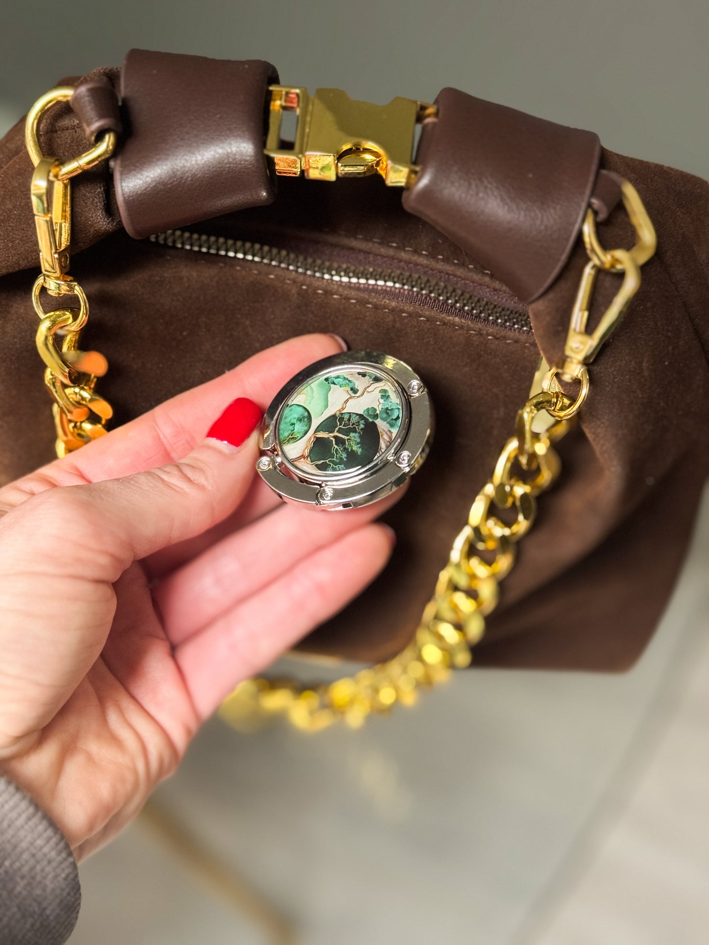 Somiņas āķītis- turētājs