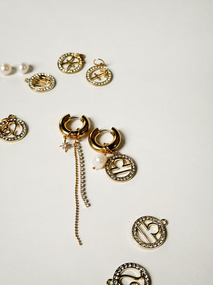 Zodiac earrings with a pearl