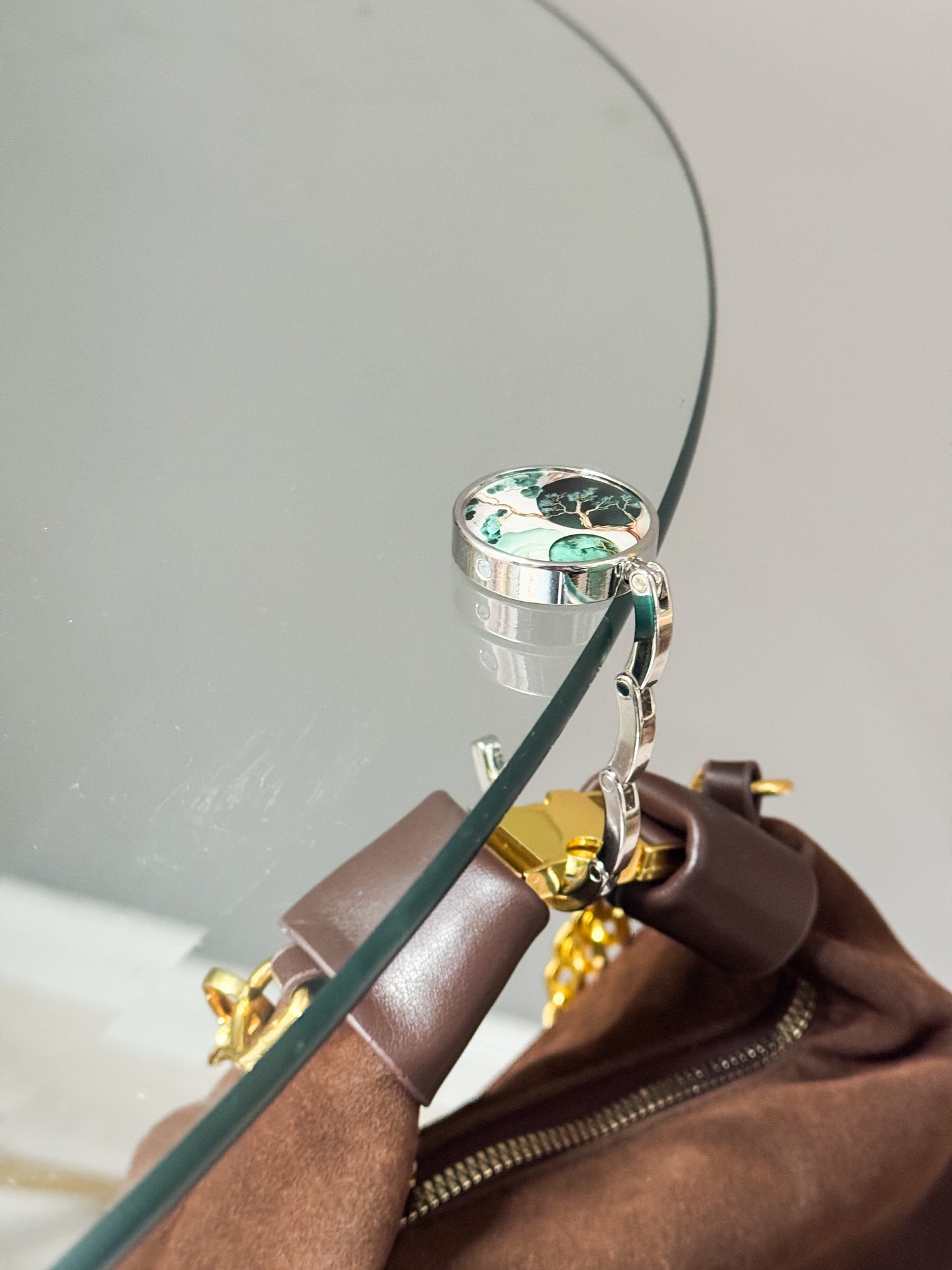 Somiņas āķītis- turētājs