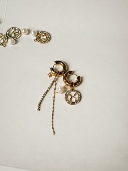 Zodiac earrings with a pearl