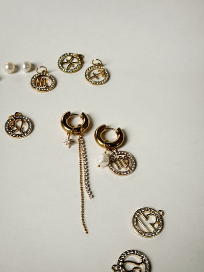 Zodiac earrings with a pearl