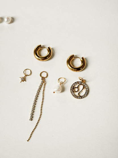 Zodiac earrings with a pearl