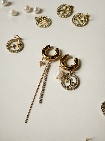 Zodiac earrings with a pearl